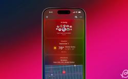 illustration of an iPhone previewing the Apple Invites app in front of a pinkish red gradient background