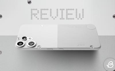 CMF Phone 2 Pro in white color floating mid air horizontally with the word review displayed in the background