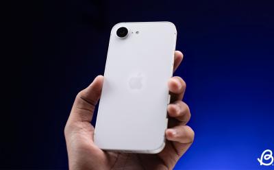 iPhone 16e held in hand showing of the design from the back