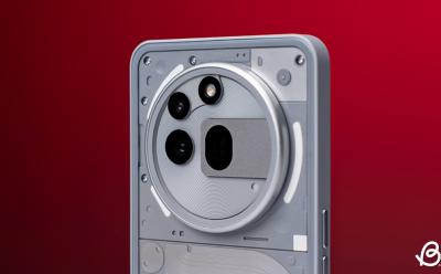 shot of the Nothing Phone 3a Pro showing the camera module in front of a red gradient background