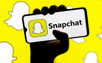 Snapchat on a smartphone held in hands